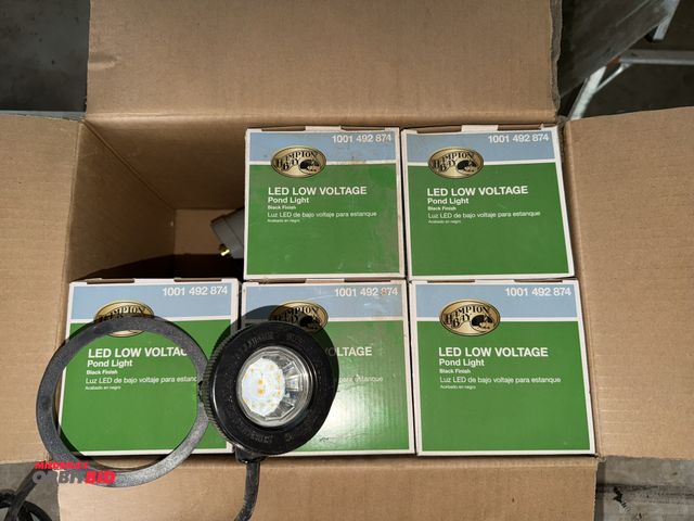 Lot 1-8354 - Lot including (6) Hampton Bay, model 1001 492 874, LED low voltage pond lights with black finish.
