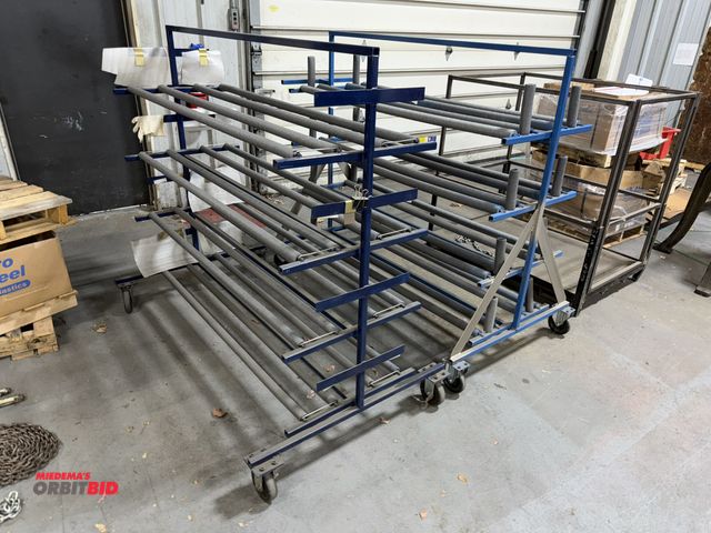 Lot 1-18767 - (2) rolling drying racks, each is 62.5" length x 3' base width x 56.5" height, winning bidder respon...
