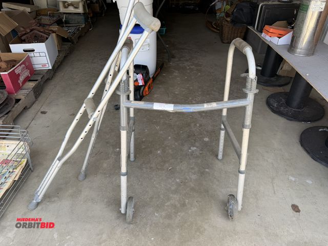 Lot 1-8387 - (1) 300 lb. capacity foldable walker, and (1) set of adjustable height crutches.