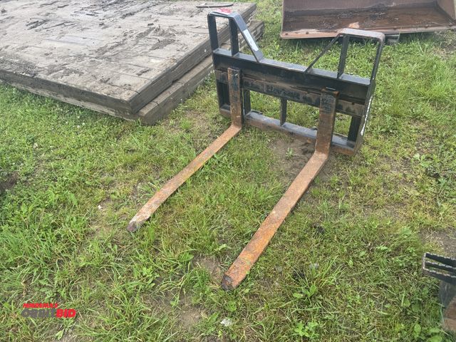 Lot 1-19725 - (1) set of Glacier 48" x 4" wide skid steer quick attach forks.