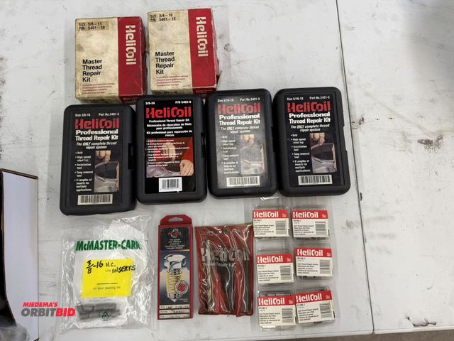 Lot 1-6160 - Large lot of assorted HeliCoil thread repair kits, and accessories.