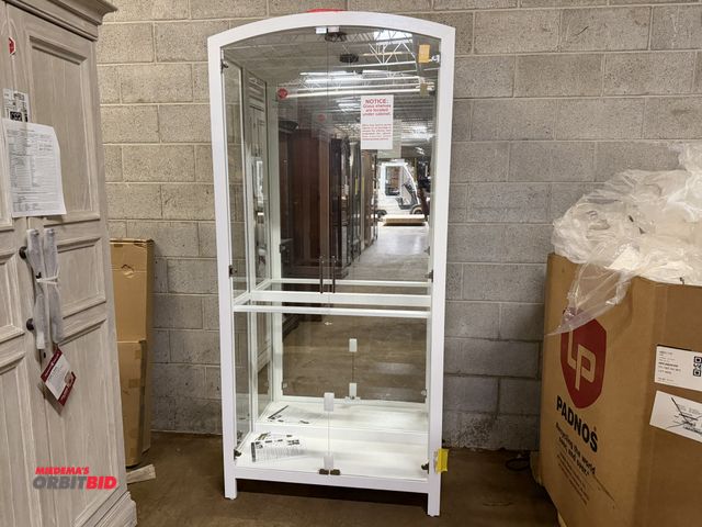 Lot 1-9257 - (1) Howard Miller illuminated 2-door curio/display cabinet, 38.5" wide x 16" deep x 82.5" tall, mode...