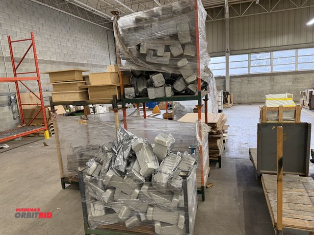 Lot 1-17391 - (7) 48" length x 9" height x 35.5" depth stackable steel racks, and (4) skids of assorted packing ma...