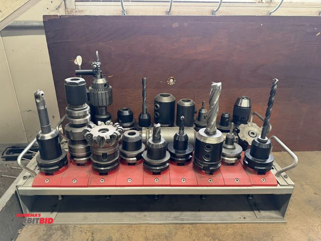 Lot 1-1002 - Set of (2) 24" x 4" x 5-1/2" Lista tool stands with various BT 40 tool holders, includes some cuttin...