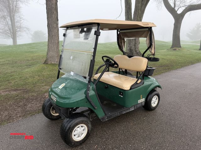Lot 1-19334 - (1) 2015 E-Z-Go golf cart with a Kawasaki gas engine, includes canopy, ball cover, club cover, fold-...