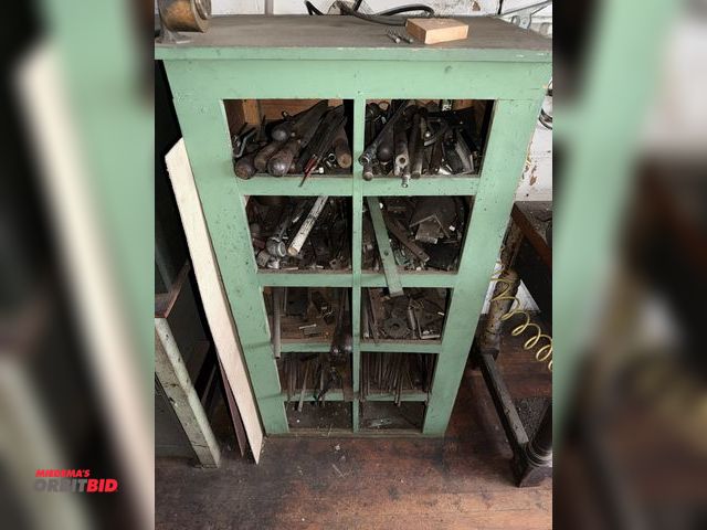 Lot 1-4708 - (1) wood cabinet filled with assorted files, machine parts, tools, sewing machine items, and more.