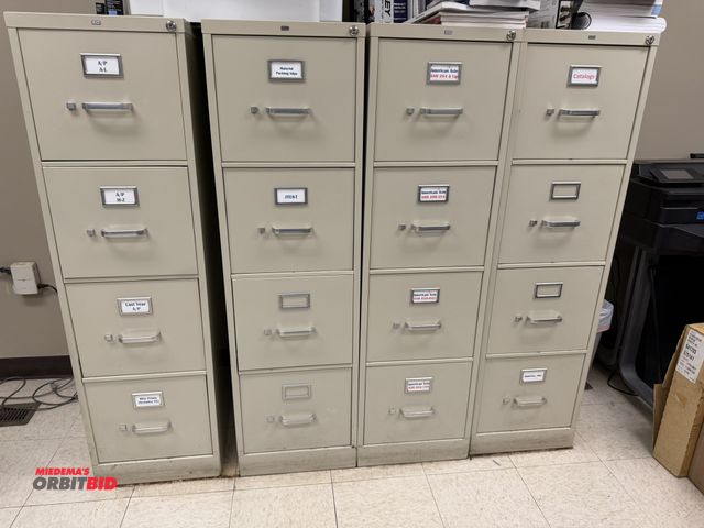 Lot 1-14545 - Lot of (4) Hon 15" width x 52" height x 25" depth 4-drawer steel file cabinets.