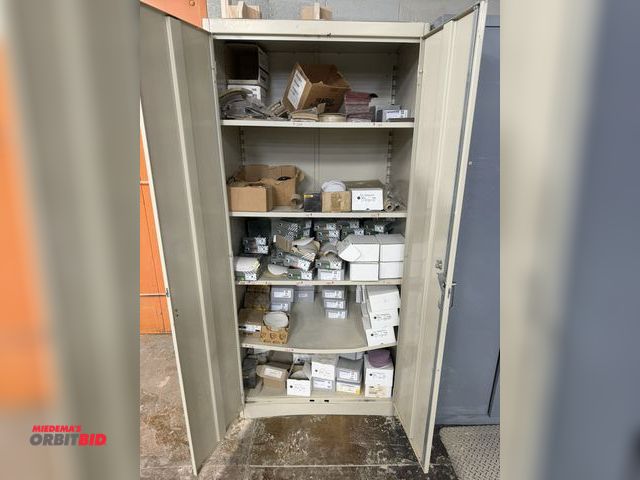 Lot 1-16464 - (1) 36", 2-door cabinet with assorted sanding supplies, includes Rhynogrip sanding discs, various gr...
