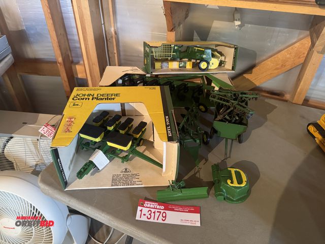 Lot 1-3179 - Assorted John Deere Implement Die Cast, (1) Corn Planter (in box), (1) Square Baler (in box), (1) Pl...