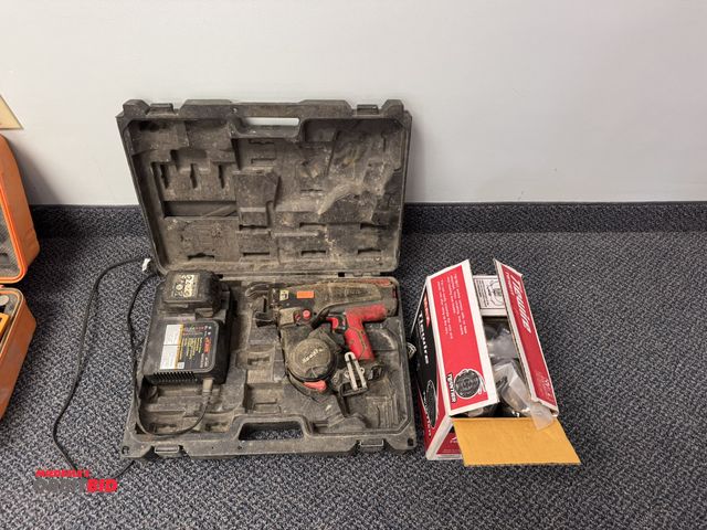 Lot 1-18659 - (1) Re-Bar-Tier battery powered 14.4V battery with charger, new box of tie wire, and case.