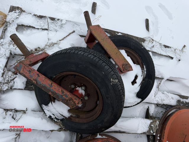 Lot 1-11670 - (2) caster wheels with 205/75R15 tires, 2" diameter post, tires are cracked and dry rotted.