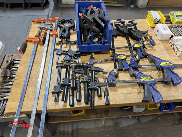 Lot 1-18871 - Large lot of assorted clamps, includes adjustable bar clamps, Irwin Quick Grip clamps, F straps, and...