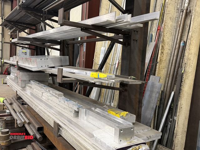 Lot 1-15378 - (3) rows of assorted aluminum stock, (4) are approx. 10.5" x 3/4" x 12' long, aluminum pieces includ...