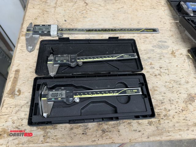 Lot 1-16635 - Lot of (2) Mitutoyo 6" digital calipers, and (1) 12" digital caliper, in working condition, and (1) ...