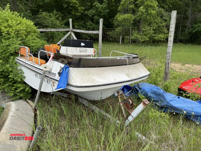 Lot 1-6651 - (1) Viking sportdeck style boat, approx. 14', severe weather damage, MC#8803KY, no motor, Hull ID# V...