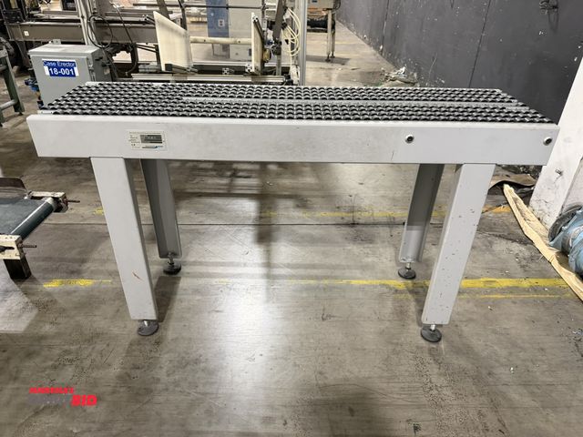 Lot 1-5596 - (1) Muller Martini, model 0451.0570, 14.5" wide x 5' long roller conveyor section with heavy duty st...