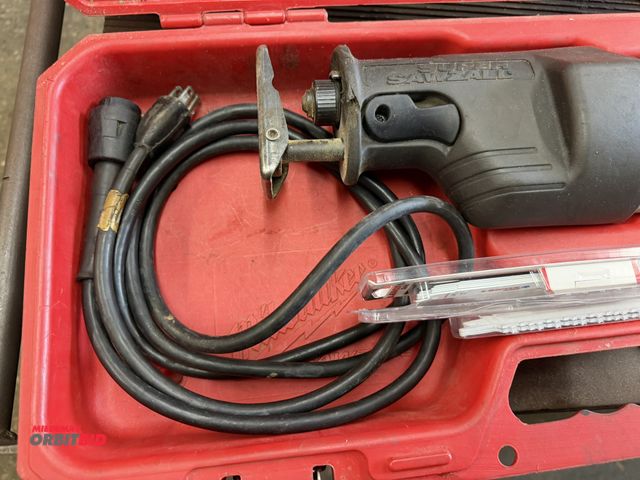 Lot 1-6448 - (1) Milwaukee 120V, single phase Sawzall with assorted blades, and high-impact plastic case.