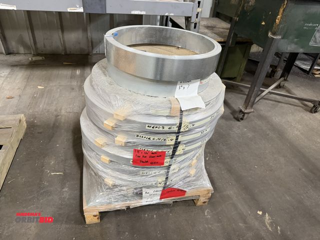 Lot 1-18661 - (1) skid with (8) spools of 1.5" x .016 clear coat aluminum coils, and (2) unknown size coils.
