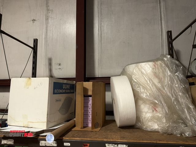 Lot 1-18751 - Assorted packing items, includes (5) rolls of Pregis 1/8" micro foam, partial box of Uline Economy b...