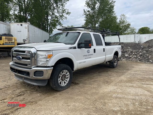 Lot 1-19704 - 2016 Ford F350 SD XLT 4 x 4 crew cab pickup truck, long box, power windows, mirrors, and locks, auto...