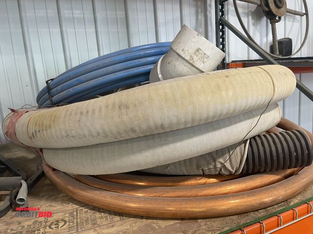 Lot 1-18795 - Lot of 4" drainage tile, (1) partial roll of 2" heavy duty copper, and PEX piping.