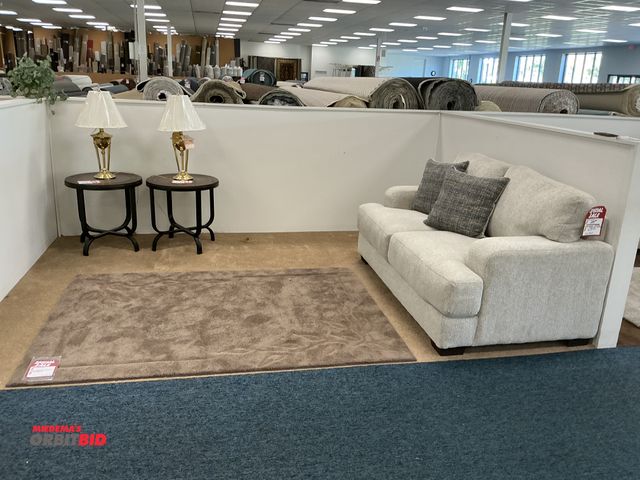 Lot 1-17195 - Living room set including couch (2) Pillows, carpet, (2) end tables and (2) lamps. Couch measures 72...