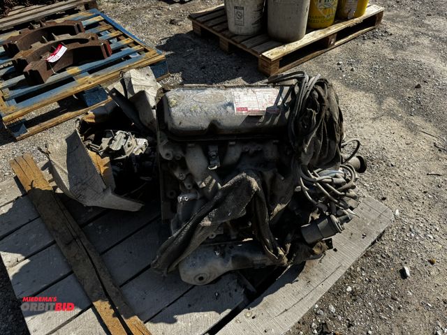 Lot 1-6955 - (1) Ford 351M 8-cylinder engine with carburetor, working condition unknown.