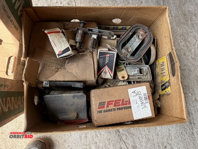 Lot 1-8564 - (1) box of assorted vintage car parts.