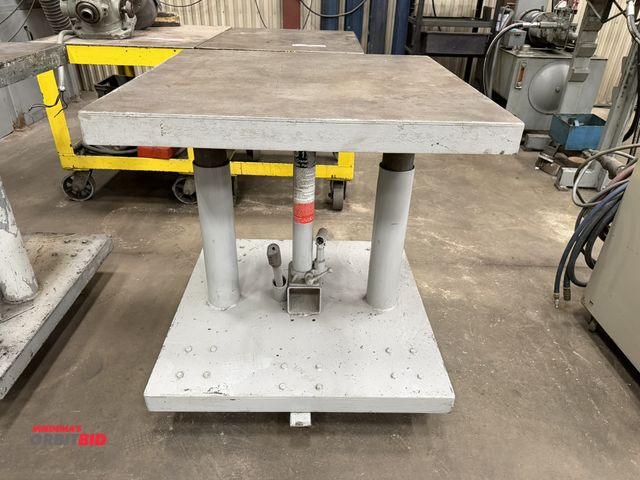 Lot 1-15389 - (1) 1.5-ton hydraulic rolling lift table, heavy duty steel top, 30" x 30".