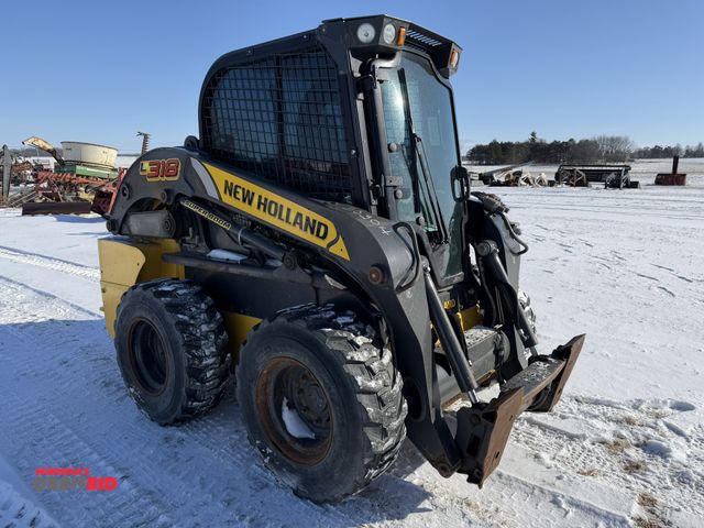 Lot 1-11754 - (1) New Holland L318 skid steer, S/N NLM487559, 12-16.5 tires, hydraulic quick attach, super boom, r...