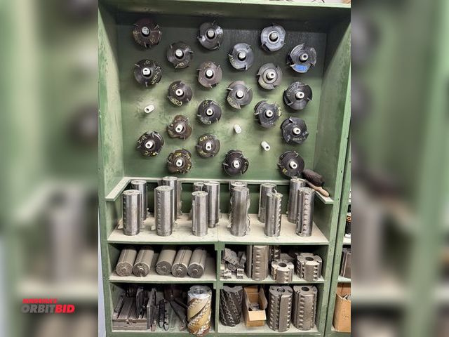 Lot 1-16360 - (1) 49.5" width x 72" height x 16" depth wood cabinet with assorted cylindrical cutting heads, shape...