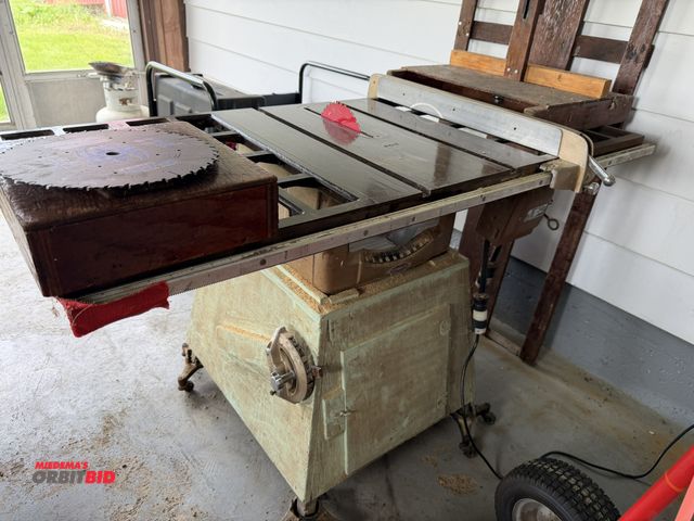 Lot 1-12155 - (1) Craftsman 10" table saw with stand, includes extra blades.