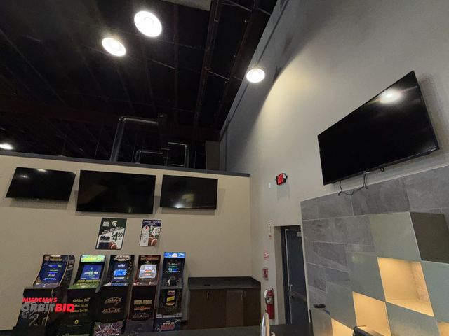 Lot 1-11304 - Lot of 4 HDMI wall mount flatscreen TV's, includes (1) Samsung 75", (2) Hisense 65" and 55", and (1)...