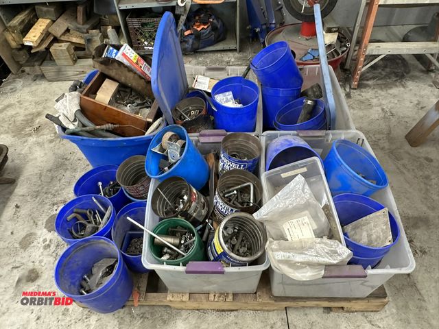 Lot 1-557 - (1) skid of assorted bolts, hose clamps, nuts, washers, and more, winning bidder responsible for pro...