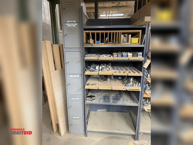 Lot 1-16648 - Rack with assorted shaper cutter blades, steel blades, edges, carbide cope and shape bits, and much ...