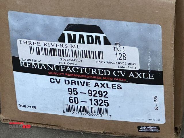 Lot 1-14139 - (1) set of NAPA CV drive axles (95-9292, 60-1325), no other info available, vehicle unknown.