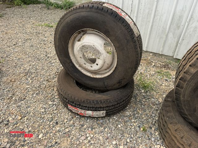 Lot 1-18257 - Lot of (2) new Firestone Transforce HT 9.50R16.5LT load range E tires, includes (1) steel rim.