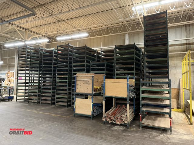 Lot 1-16223 - Lot of approx. (230) 48" x 35.5" x 9" stackable steel rack with assorted arms.