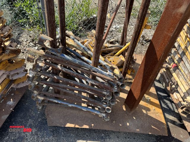 Lot 1-2656 - Skid of assorted saddle hangers, winning bidder responsible for proper removal.  (Greg)