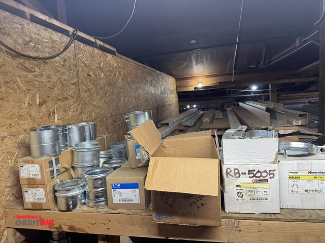 Lot 1-4281 - Contents of shelf, includes assorted connectors, 4" compression couplings, conduit hangers, steel co...
