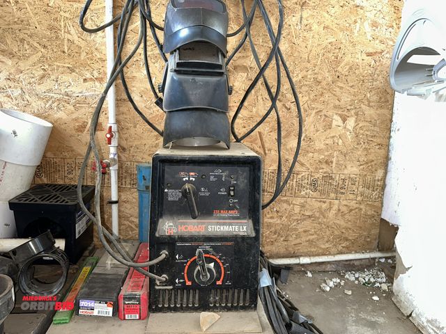 Lot 1-14133 - (1) Hobart Stickmate LX stick welder, S/N LJ240519Y (230V, single phase input), includes (3) helmets...
