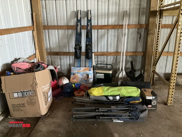 Lot 1-12014 - large lot of assorted outdoor and sporting good related items includes one oceans seven blow up pool...
