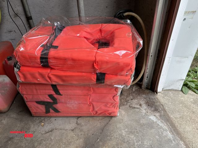Lot 1-585 - Lot of (6) life jackets.