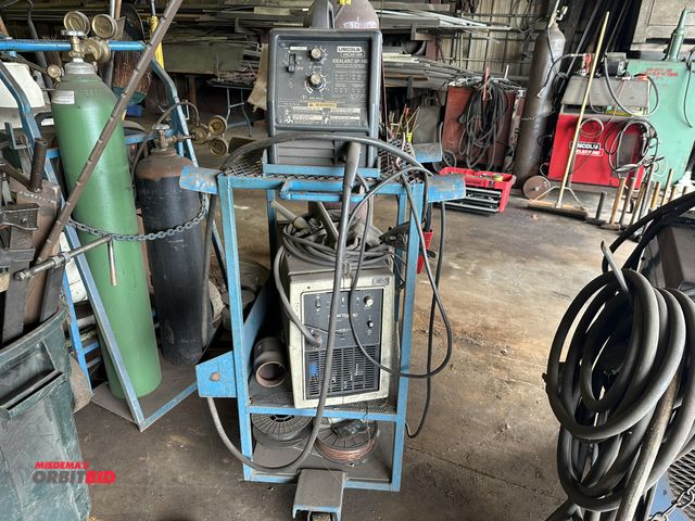 Lot 1-16175 - (1) Lincoln Idealarc SP-100 arc welder with cart, and Thermal Dynamics, model unknown, plasma cutter...