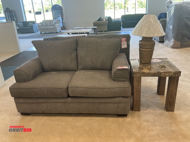 Lot 1-17170 - Love seat with end table and lamp. Love seat measures 65” by 39” deep. Table is 24” by 24” by 25” ta...