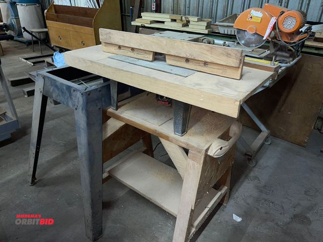 Lot 1-11686 - (1) Sears Craftsman 1 HP router table with wood stand, and includes metal stand.