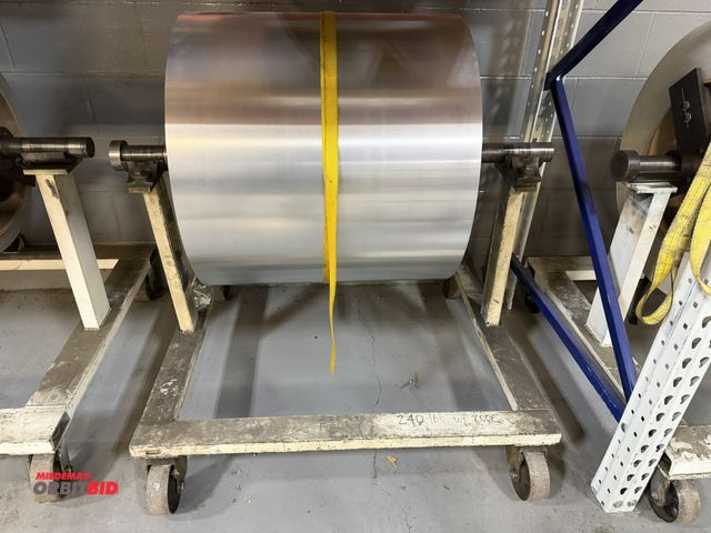 Lot 1-18705 - (1) 24" partial roll of aluminum, .040" thickness, includes stand, net weight with aluminum and stan...