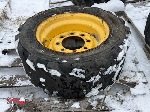 Lot 1-11685 - (1) 8-bolt skid steer tire, size 10-16.5 on medium duty rim.