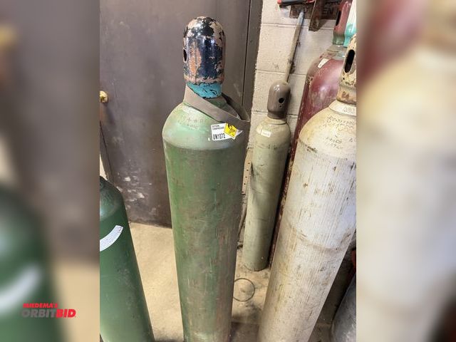 Lot 1-18519 - (1) oxygen cylinder, approx. 50" tall x 8" diameter, tank is empty.