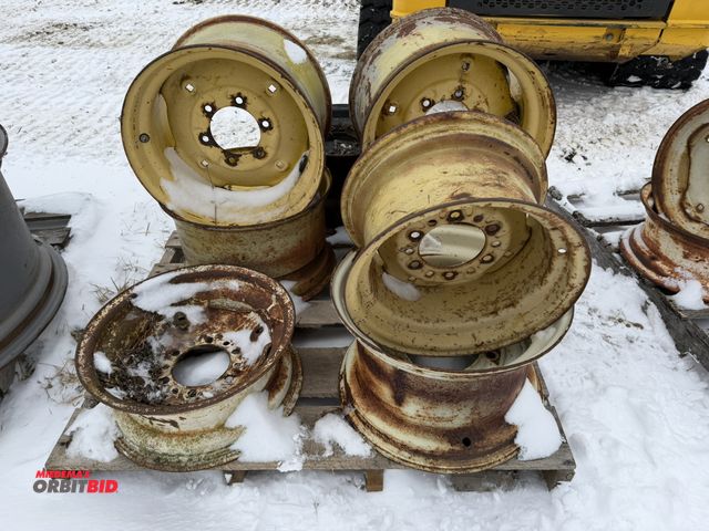 Lot 1-11675 - Lot of (8) assorted implement rims.